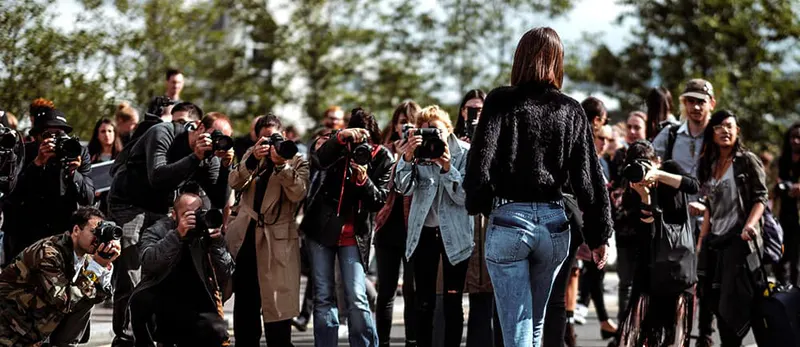 celebrity relapses in a world that never stops watching as illustrated by paparazzi photographing a celebrity
