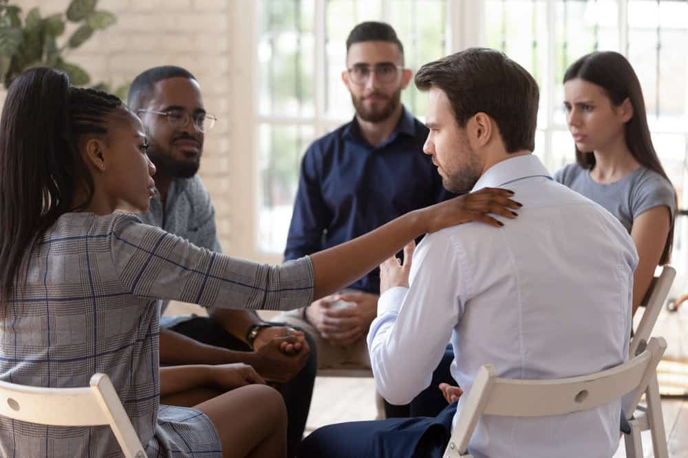 African psychologist supports male in rehab highlighting the complexities of treating addiction and mental health through dual diagnosis