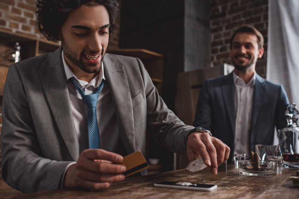 business-men-doing-drugs-to-cope-with-stress-of-deadlines-self-medication-high-expectations-performance-anxiety