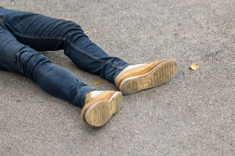 drug-overdose-death-legs-laying-on-street-drugs-central-nervous-system-drug-induced-coma-polysubstance-abuse-drug-poisoning